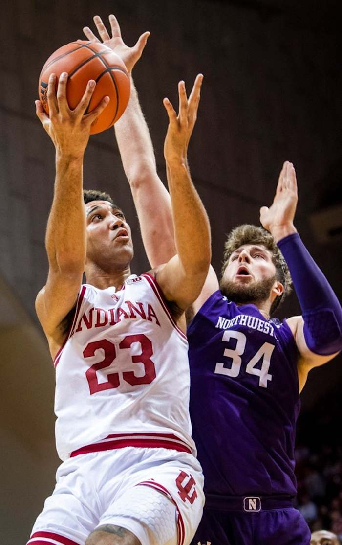 Indiana's Trayce Jackson-Davis (23) goes up against Northwestern's Matthew Nicholson (34) during the first half ot the Indiana versus Northwestern men's basketball game at Simon Skjodt Assembly Hall on Sunday, Jan. 8, 2023.